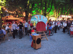 Street artist at the `Theater aan de Parade` festival on the Parade square, by night