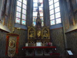Altar, altarpiece and banner in a chapel at St. John`s Cathedral