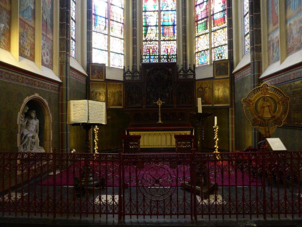Book, altar, altarpiece and relic in a chapel at St. John`s Cathedral