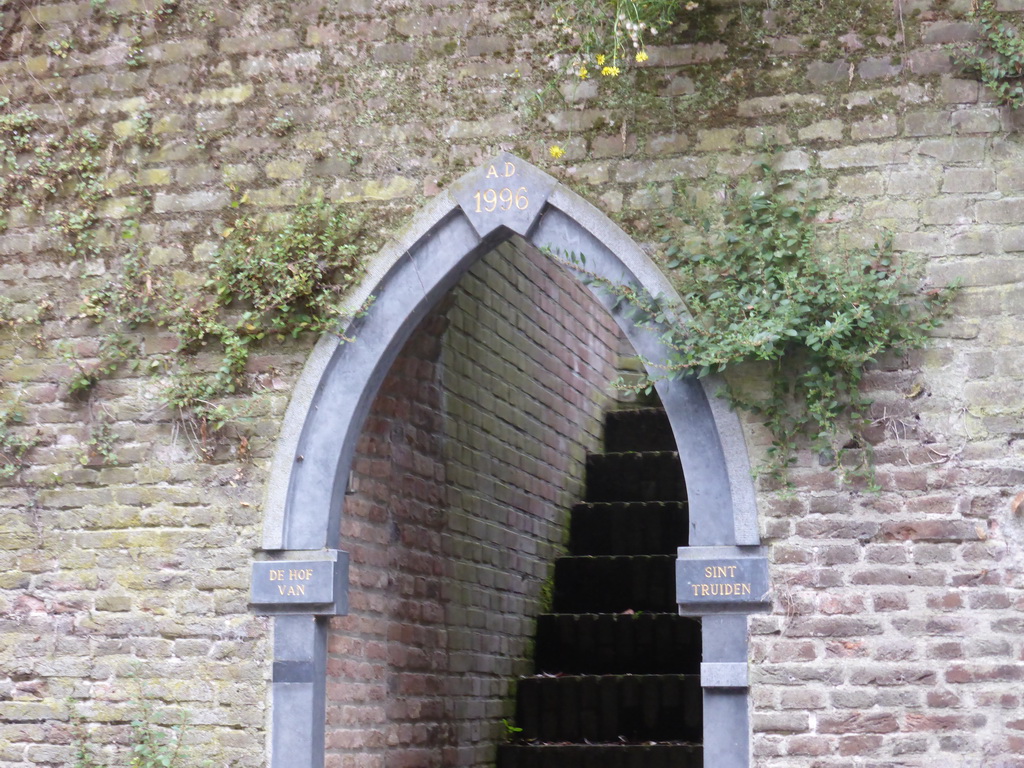 Staircase to the Hof van Sint Truiden garden, viewed from the tour boat on the Binnendieze river