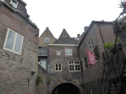 Houses hanging over the Binnendieze river, viewed from the tour boat