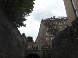 Bridge and buildings alongside the Binnendieze canal, viewed from the tour boat