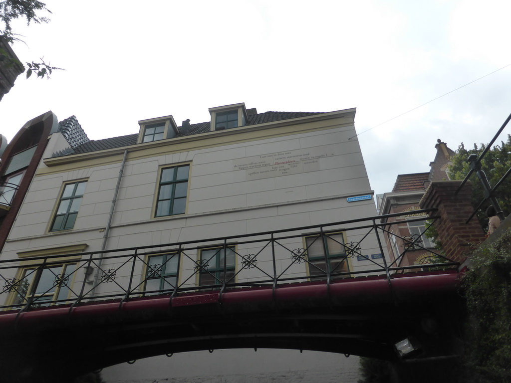 Building at the Guardianenhof street, viewed from the tour boat on the Binnendieze canal