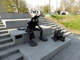 Statue `Andert de Neanderthaler` by Tom L`Istelle, at a staircase near the exit of the Sint-Jan parking garage