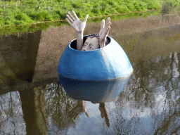 Statue of a figure from the painting `The Garden of Earthly Delights` of Hieronymus Bosch, at the west side of the Stadsgracht canal at the Zuiderpark