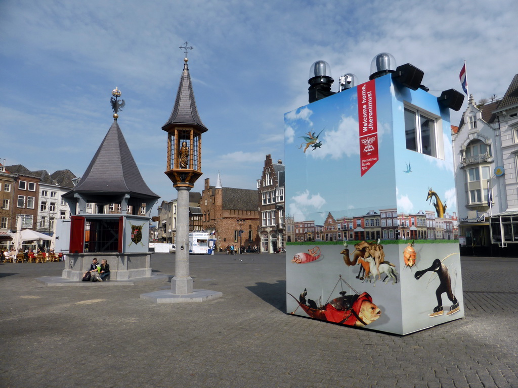 The Markt square with the Puthuis and Onze Lieve Vrouwehuisje structures, a poster of the Jeroen Bosch Year and the Moriaan building