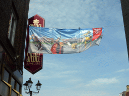 Banner of the Jeroen Bosch Year above the Kerkstraat street