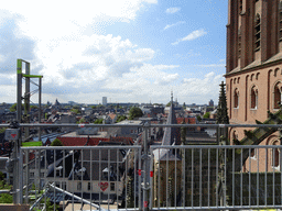 The southwest side and the west tower of St. John`s Cathedral and the city center, viewed from the lower platform of the `Een Wonderlijke Klim` exhibition