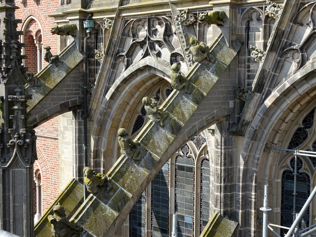 Flying Buttresses at the second row at the southwest side of St. John`s Cathedral: `The Lioness`, `The Deformed Ape`, `The Blindfolded Man`, `Flute Player`, `Triangle Player` and `Musician with Bug Drum`, viewed from the lower platform of the `Een Wonderlijke Klim` exhibition