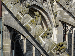 Flying Buttresses at the fifth row at the south side of St. John`s Cathedral: `2 Legged Monster`, `Bird of Prey`, `Man with Milk Churn`, `Monkey with Cub`, viewed from the lower platform of the `Een Wonderlijke Klim` exhibition