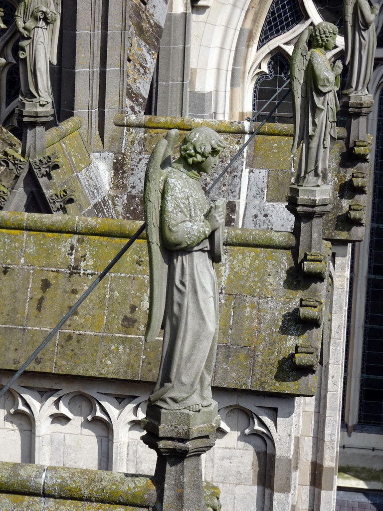 Angel statues at the south side of St. John`s Cathedral, viewed from the lower platform of the `Een Wonderlijke Klim` exhibition