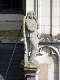 Statue of an angel with a telephone at the south side of St. John`s Cathedral, viewed from the lower platform of the `Een Wonderlijke Klim` exhibition