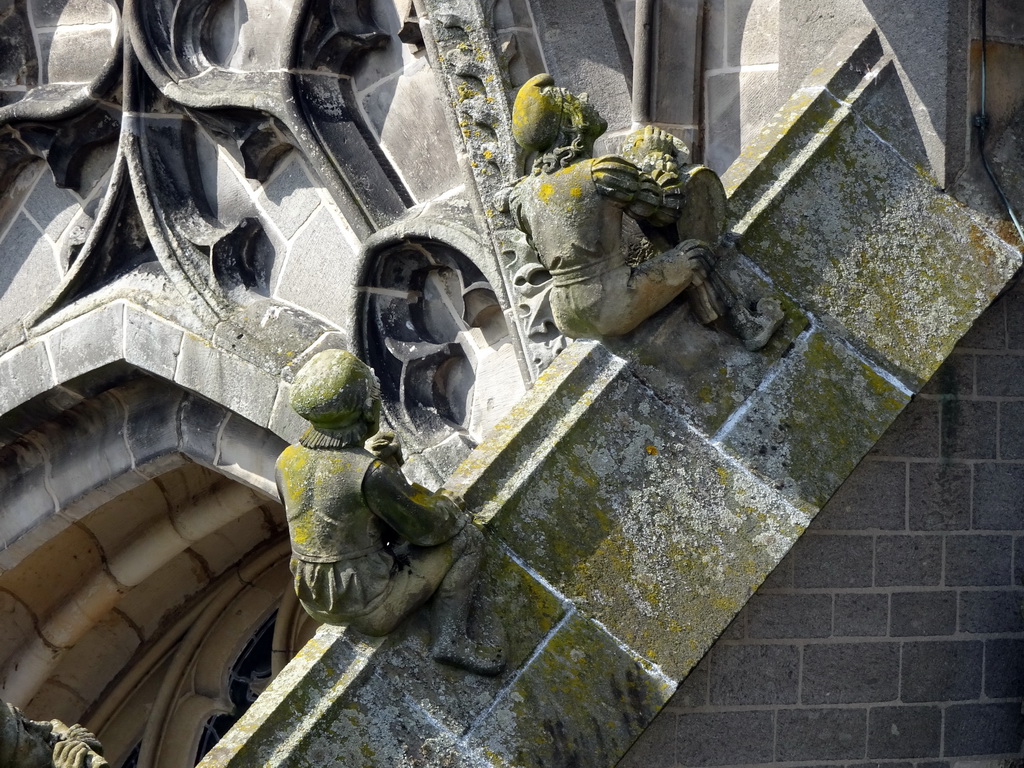 Flying Buttresses at the second row at the southwest side of St. John`s Cathedral: `Triangle Player` and `Musician with Bug Drum`, viewed from the lower platform of the `Een Wonderlijke Klim` exhibition