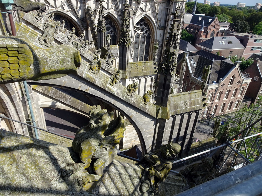 Gargoyle and Flying Buttresses at the fourth row at the south side of St. John`s Cathedral: `Winged Dragon`, `King Melchior` and `King Caspar`, viewed from the upper platform of the `Een Wonderlijke Klim` exhibition