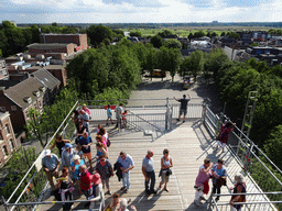 The lower platform of the `Een Wonderlijke Klim` exhibition at St. John`s Cathedral, the Parade square and the Bossche Broek nature area, viewed from the upper platform