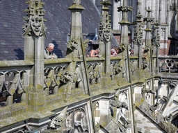 People in the gutter at the south side of St. John`s Cathedral, viewed from the upper platform of the `Een Wonderlijke Klim` exhibition