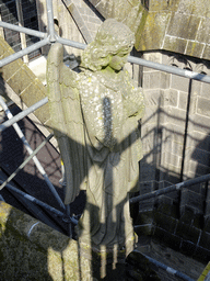 Angel statue at the south side of St. John`s Cathedral, viewed from the lower platform of the `Een Wonderlijke Klim` exhibition