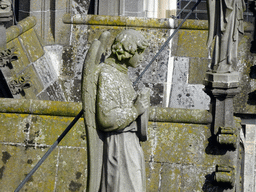 Angel statue at the south side of St. John`s Cathedral, viewed from the lower platform of the `Een Wonderlijke Klim` exhibition