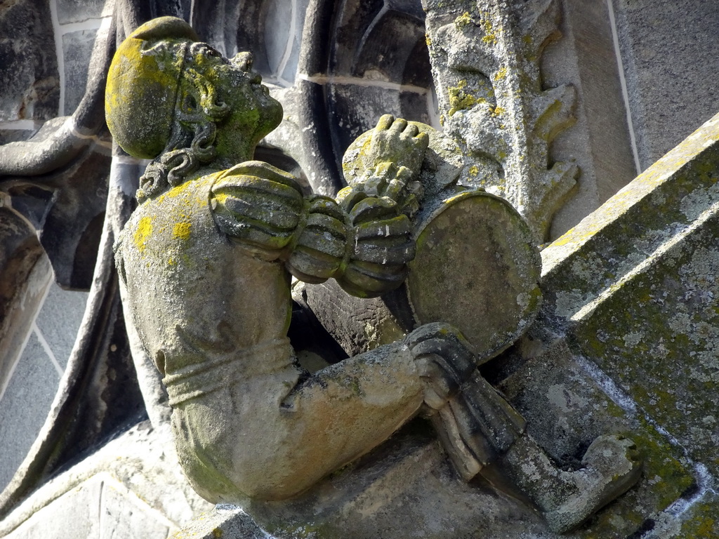 Flying Buttress at the second row at the southwest side of St. John`s Cathedral: `Musician with Big Drum`, viewed from the lower platform of the `Een Wonderlijke Klim` exhibition