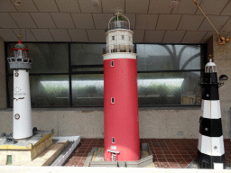 Scale models of lighthouses in the lobby of Fort Kijkduin