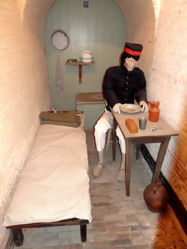 Wax statue of the lighthouse keeper at the museum at Fort Kijkduin