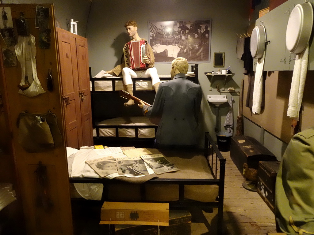 Wax statues of soldiers making music at the museum at Fort Kijkduin