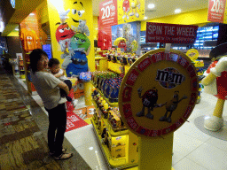 Miaomiao and Max at the M&M`s shop at the Transfer Hall of Singapore Changi Airport