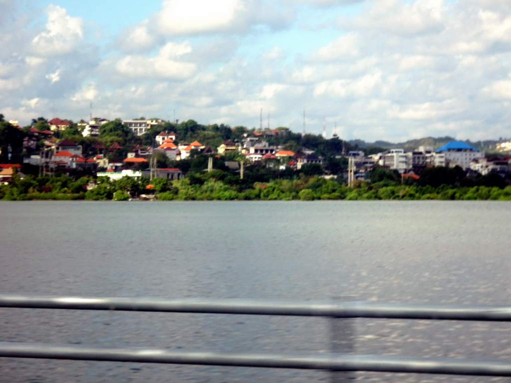 Houses at the south side of the city, viewed from the taxi from Nusa Dua to Gianyar on the Bali Mandara Toll Road
