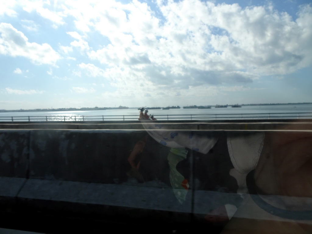 Boats in the Gulf of Benoa, viewed from the taxi from Nusa Dua to Gianyar on the Bali Mandara Toll Road
