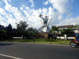 Statue in front of the Pangkalan Tni-Al Dps barracks at the Jalan Raya Sesetan street, viewed from the taxi from Nusa Dua to Gianyar