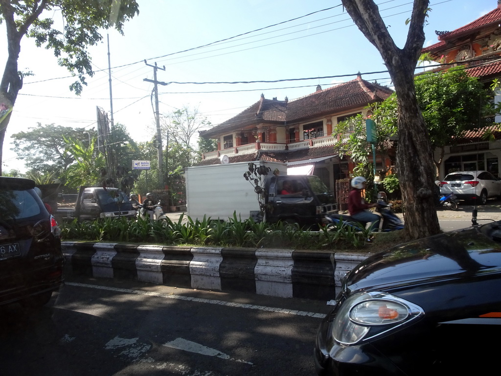 Buildings at the Wage Rudolf Supratman street, viewed from the taxi from Nusa Dua to Gianyar