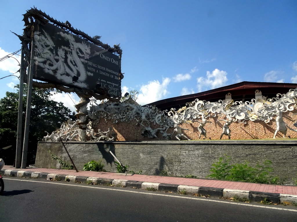 Front of the UC Silver Gold Bali sculpture shop at the Wage Rudolf Supratman street, viewed from the taxi from Nusa Dua to Gianyar