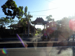 Front of the Puriwood Furniture shop at the Jalan By Pass Ngurah Rai street, viewed from the taxi from Gianyar to Nusa Dua