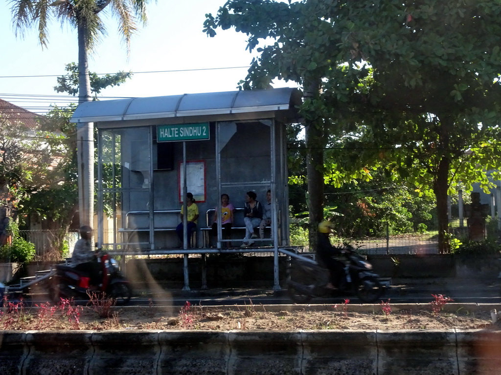 Bus stop at the Jalan By Pass Ngurah Rai street, viewed from the taxi from Gianyar to Nusa Dua