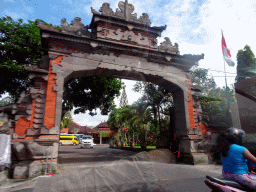 Gate at the Wage Rudolf Supratman street, viewed from the taxi from Nusa Dua to Ubud