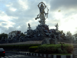 The Patung Titi Banda statue at the Jalan By Pass Ngurah Rai street, viewed from the taxi from Ubud to Jimbaran