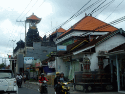 Houses and tower at the Jalan Raya Kerobokan street, viewed from the taxi from Nusa Dua to Beraban
