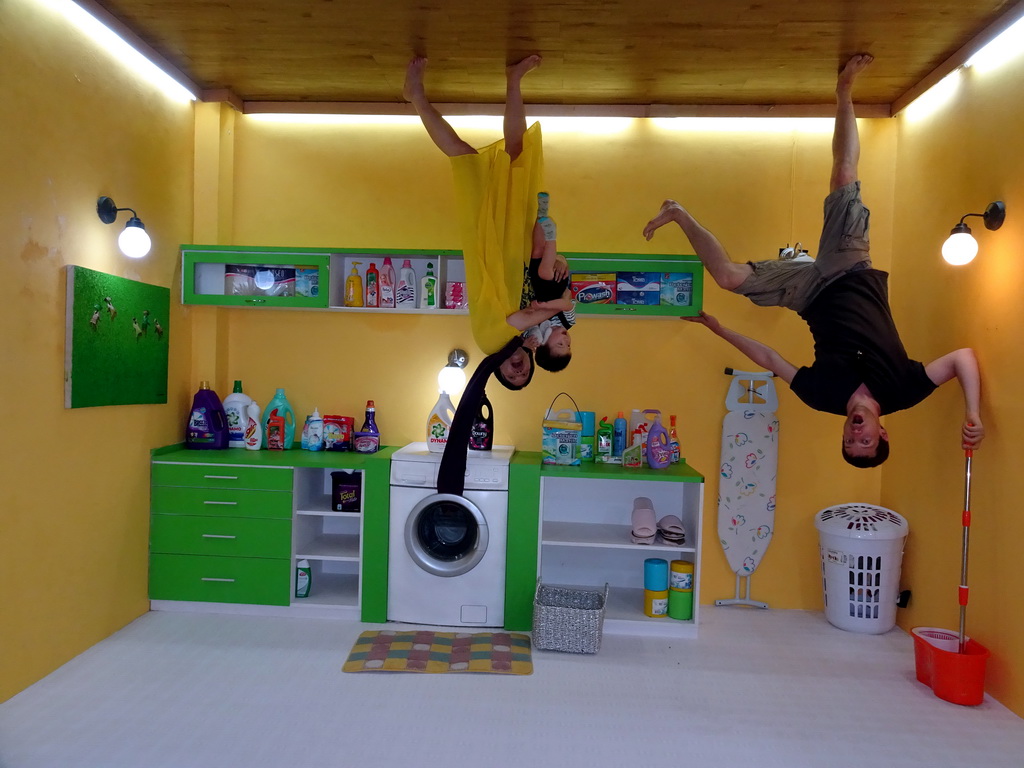 Tim, Miaomiao and Max in a laundry room at the Upside Down World Bali