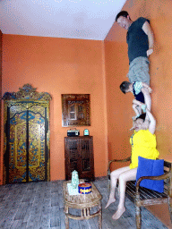 Tim, Miaomiao and Max in a living room at the Upside Down World Bali