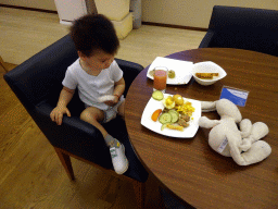 Max eating at the business class lounge of KLM at Ngurah Rai International Airport