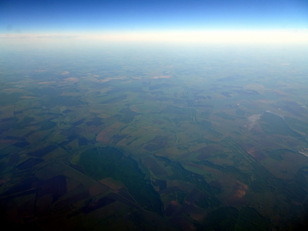Fields and forests in Eastern Europe, viewed from the airplane from Singapore to Amsterdam