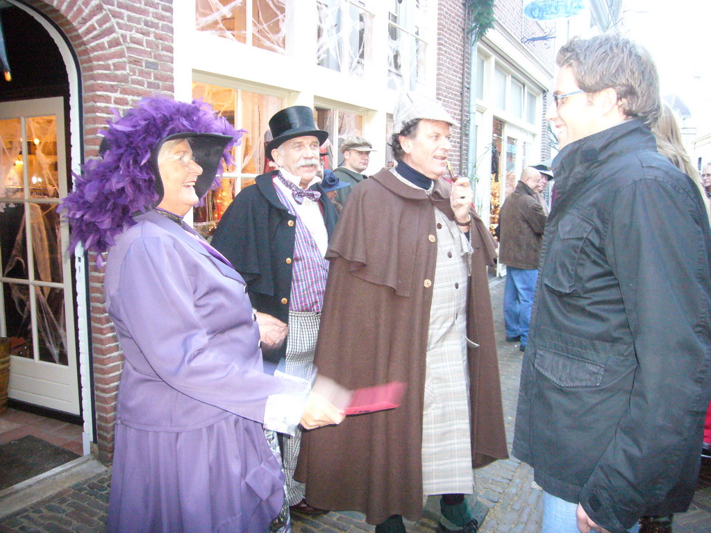 Actors in Victorian clothing at the Walstraat street, during the Dickens Festival