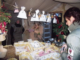 Street food stand and actors in Victorian clothing at the Walstraat street, during the Dickens Festival