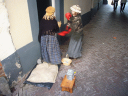 Children actors in Victorian clothing at the Prinsenplaats square, during the Dickens Festival