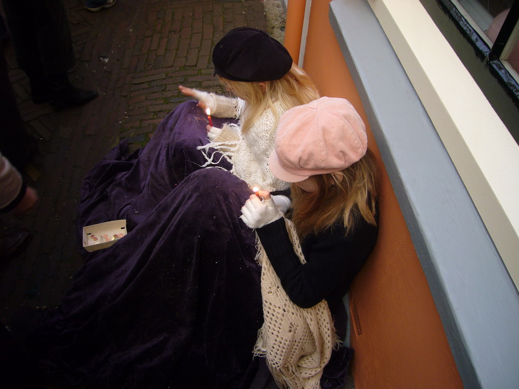 Children actors in Victorian clothing at the Prinsenplaats square, during the Dickens Festival