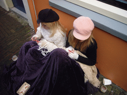 Children actors in Victorian clothing at the Prinsenplaats square, during the Dickens Festival