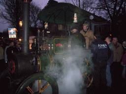 Old locomotive at the Bergkerkplein square, during the Dickens Festival parade, at sunset