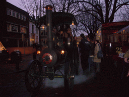Old locomotive at the Bergkerkplein square, during the Dickens Festival parade, at sunset