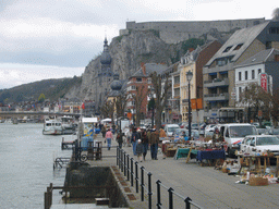 Boats in the Meuse river, the Avenue Winston Churchill, the Pont Charles de Gaulle bridge, the Notre Dame de Dinant church and the Citadel of Dinant