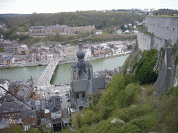 The city center with the Notre Dame de Dinant church and the Pont Charles de Gaulle bridge over the Meuse river, viewed from the top of the cable car ride to the Citadel of Dinant
